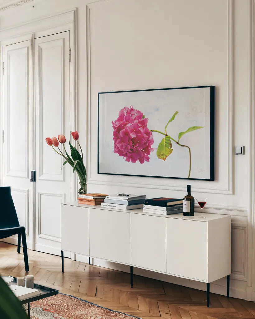 Bright Pink Hydrangea by Deborah Revell. shown as a framed stretched canvas in a living room above a console. Available as a archival giclee rolled canvas, fine art paper, or poster print. SKU 93153i.