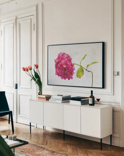 Bright Pink Hydrangea by Deborah Revell. shown as a framed stretched canvas in a living room above a console. Available as a archival giclee rolled canvas, fine art paper, or poster print. SKU 93153i.