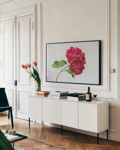 Bright Red Hydrangea by Deborah Revell. shown as a framed stretched canvas in a living room above a console. Available as a archival giclee rolled canvas, fine art paper, or poster print. SKU 93154i.