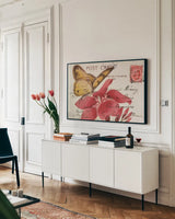 Butterfly Postcard II by Deborah Revell. shown as a framed stretched canvas in a living room above a console. Available as a archival giclee rolled canvas, fine art paper, or poster print. SKU 91113i.