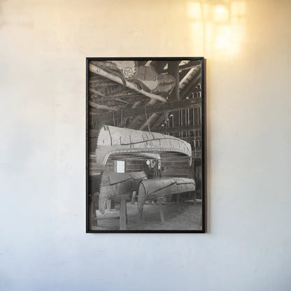 Canoe Barn by Deborah Revell. shown as a paper print in a black flame. Available as a archival giclee rolled canvas, fine art paper, or poster print. SKU 96600h.