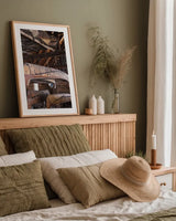 Canoe Barn II by Deborah Revell. shown as a paper print in a natural frame. Available as a archival giclee rolled canvas, fine art paper, or poster print. SKU 99670h.