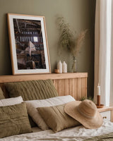 Canoe Barn III by Deborah Revell. shown as a paper print in a natural frame. Available as a archival giclee rolled canvas, fine art paper, or poster print. SKU 99671h.