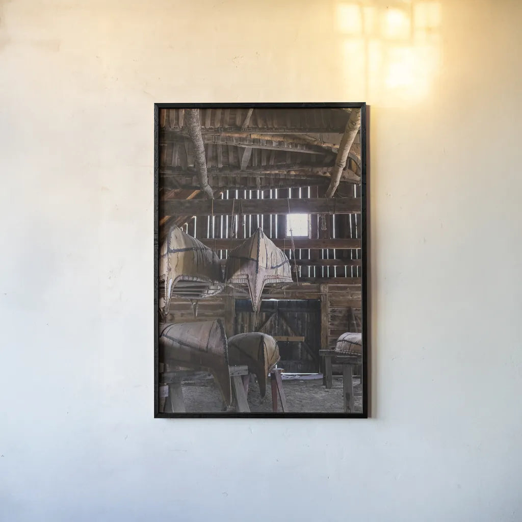 Canoe Barn III by Deborah Revell. shown as a paper print in a black flame. Available as a archival giclee rolled canvas, fine art paper, or poster print. SKU 99671h.