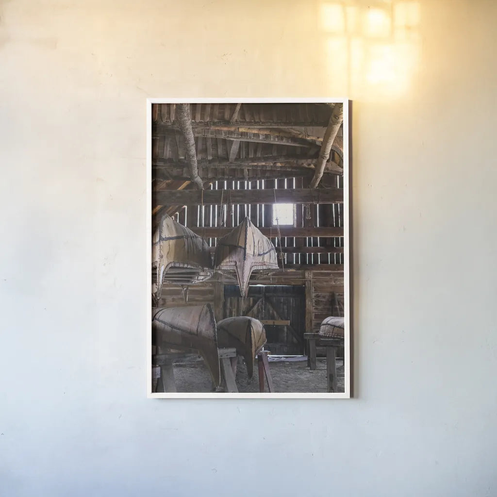 Canoe Barn III by Deborah Revell. shown as a paper print in a white frame. Available as a archival giclee rolled canvas, fine art paper, or poster print. SKU 99671h.