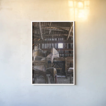 Canoe Barn III by Deborah Revell. shown as a paper print in a white frame. Available as a archival giclee rolled canvas, fine art paper, or poster print. SKU 99671h.