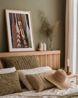 Canoe Paddles by Deborah Revell. shown as a paper print in a natural frame. Available as a archival giclee rolled canvas, fine art paper, or poster print. SKU 96601h.