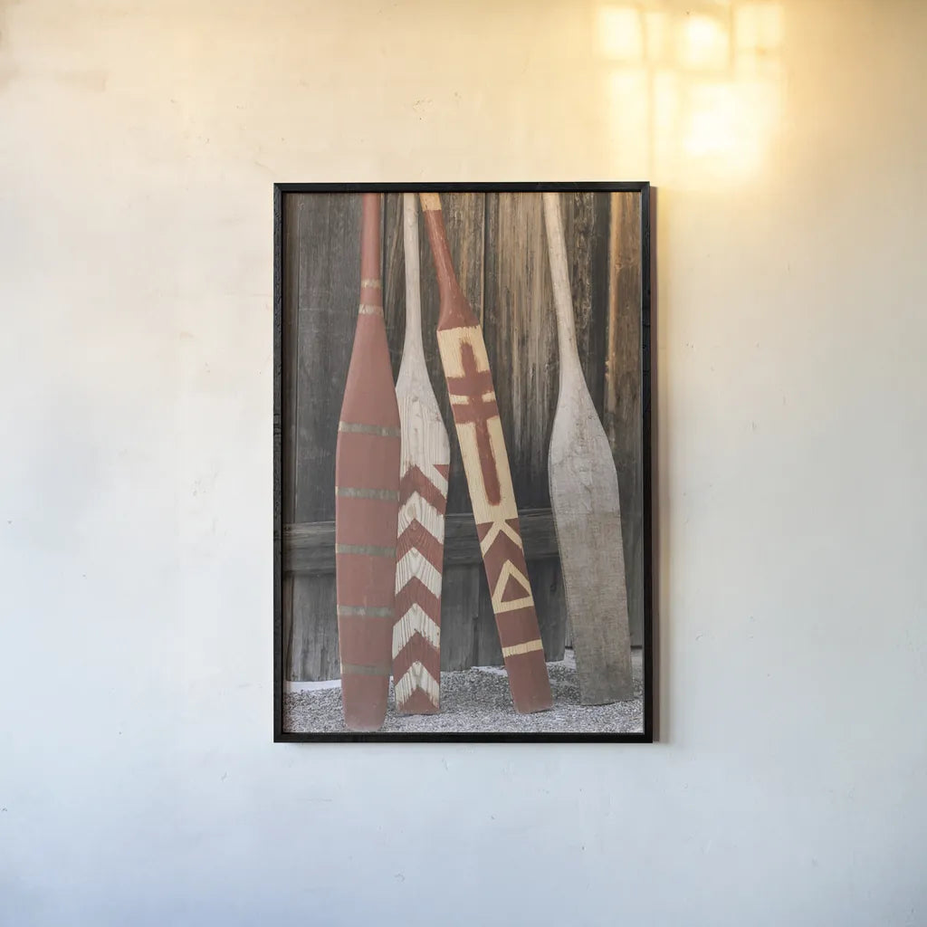 Canoe Paddles by Deborah Revell. shown as a paper print in a black flame. Available as a archival giclee rolled canvas, fine art paper, or poster print. SKU 96601h.