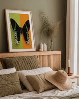 Chromatic Butterfly IV by Deborah Revell. shown as a paper print in a natural frame. Available as a archival giclee rolled canvas, fine art paper, or poster print. SKU 96046h.