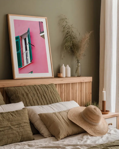 Cinque Terre Pink by Deborah Revell. shown as a paper print in a natural frame. Available as a archival giclee rolled canvas, fine art paper, or poster print. SKU 95016h.