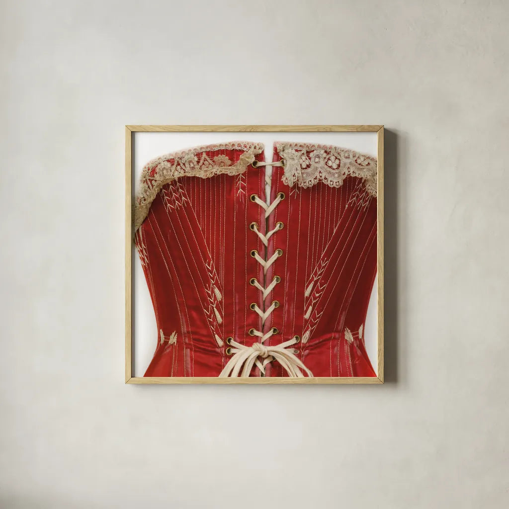 Corset I by Deborah Revell. Shown in a natural wood glass frame for a timeless modern aesthetic. Available as an archival giclee rolled canvas, fine art paper, or poster print. SKU 92283a.