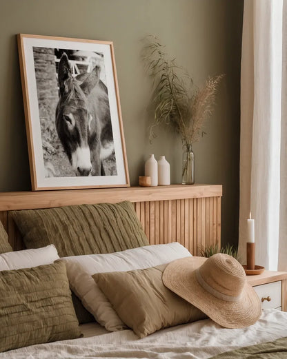 Cottage Donkey I by Deborah Revell. shown as a paper print in a natural frame. Available as a archival giclee rolled canvas, fine art paper, or poster print. SKU 100059h.