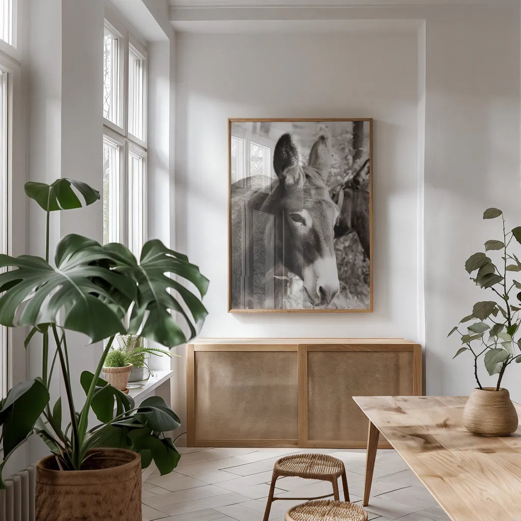 Cottage Donkey II by Deborah Revell. shown as a print in a natural wood frame in a dining room. Available as a archival giclee rolled canvas, fine art paper, or poster print. SKU 100060h.
