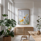 Daisies by Deborah Revell. shown as a print in a natural wood frame in a dining room. Available as a archival giclee rolled canvas, fine art paper, or poster print. SKU 93427h.