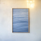 Dancing Sea I by Deborah Revell. shown as a paper print in a natural frame. Available as a archival giclee rolled canvas, fine art paper, or poster print. SKU 102764h.