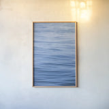 Dancing Sea II by Deborah Revell. shown as a paper print in a natural frame. Available as a archival giclee rolled canvas, fine art paper, or poster print. SKU 102765h.