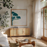 Dartington Tree II by Deborah Revell. Shown in a natural wood frame in a cozy modern living room. Available as an archival giclee rolled canvas, fine art paper, or poster print. SKU 94276a.