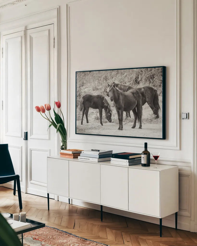 Dartmoor Ponies II by Deborah Revell. shown as a framed stretched canvas in a living room above a console. Available as a archival giclee rolled canvas, fine art paper, or poster print. SKU 94278i.