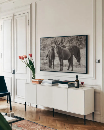 Dartmoor Ponies III by Deborah Revell. shown as a framed stretched canvas in a living room above a console. Available as a archival giclee rolled canvas, fine art paper, or poster print. SKU 94279i.