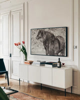 Dartmoor Ponies IV by Deborah Revell. shown as a framed stretched canvas in a living room above a console. Available as a archival giclee rolled canvas, fine art paper, or poster print. SKU 94280i.