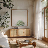 Desert Treasures II by Deborah Revell. Shown in a natural wood frame in a cozy modern living room. Available as an archival giclee rolled canvas, fine art paper, or poster print. SKU 94580a.
