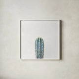Desert Treasures III by Deborah Revell. Shown in a crisp white glass frame for a clean and minimalist style. Available as an archival giclee rolled canvas, fine art paper, or poster print. SKU 94581a.