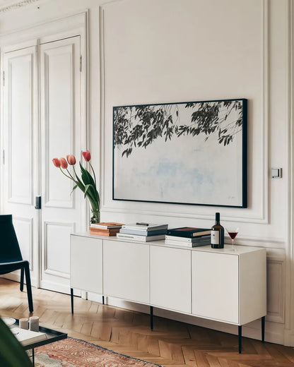 Eucalyptus by Deborah Revell. shown as a framed stretched canvas in a living room above a console. Available as a archival giclee rolled canvas, fine art paper, or poster print. SKU 93443i.