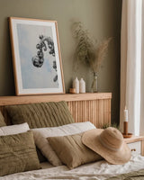 Fiddle Fern II by Deborah Revell. shown as a paper print in a natural frame. Available as a archival giclee rolled canvas, fine art paper, or poster print. SKU 94827h.