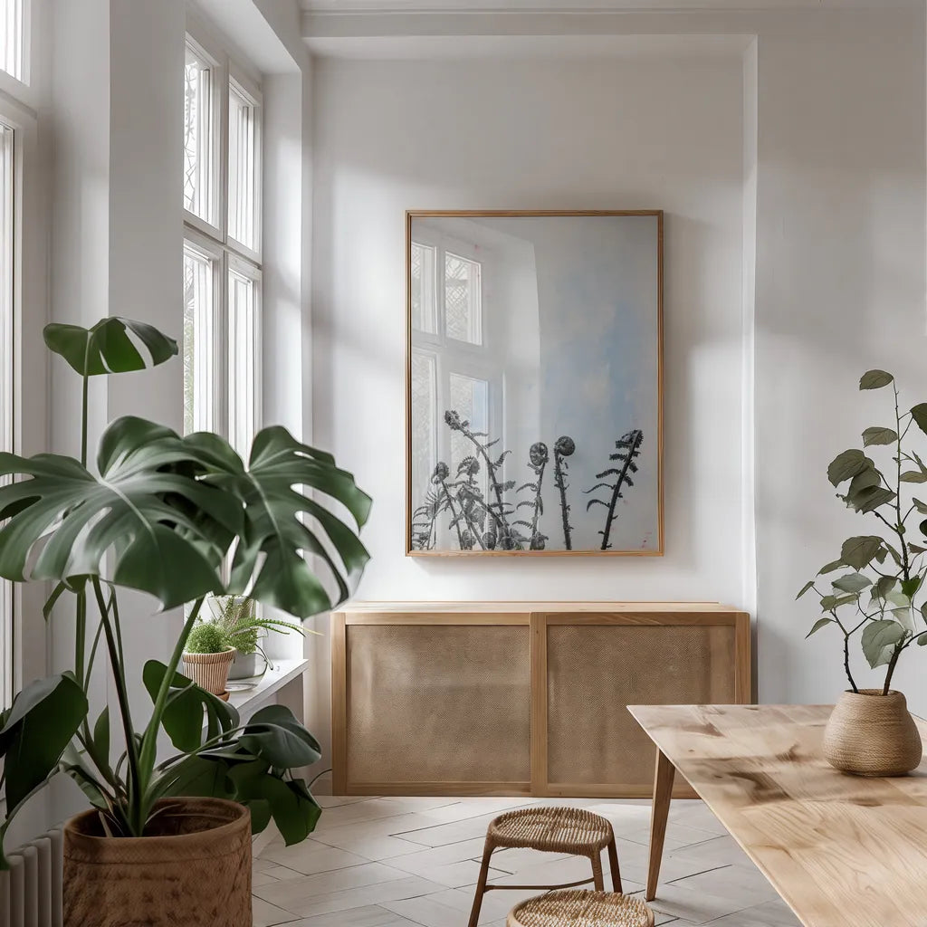 Fiddle Fern VII by Deborah Revell. shown as a print in a natural wood frame in a dining room. Available as a archival giclee rolled canvas, fine art paper, or poster print. SKU 94832h.