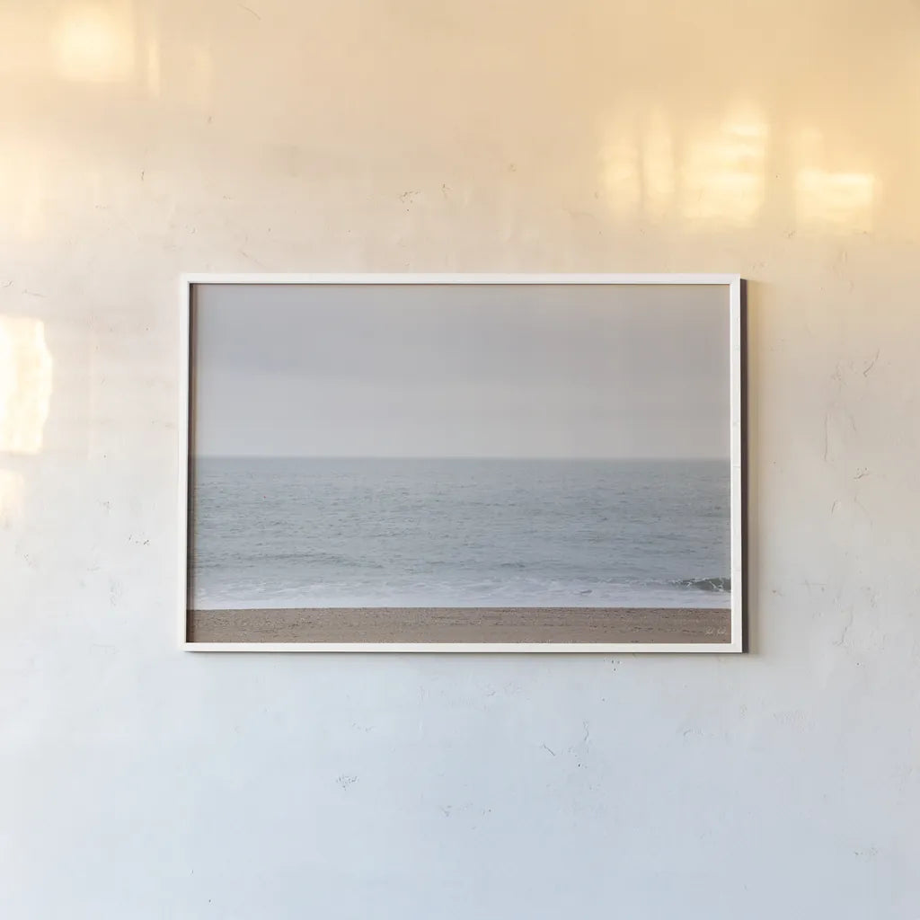 Gentle Sea I by Deborah Revell. shown as a paper print in a white frame. Available as a archival giclee rolled canvas, fine art paper, or poster print. SKU 100317i.