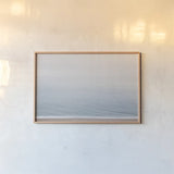Gentle Sea II by Deborah Revell. shown as a paper print in a natural frame. Available as a archival giclee rolled canvas, fine art paper, or poster print. SKU 100318i.
