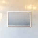 Gentle Sea II by Deborah Revell. shown as a paper print in a white frame. Available as a archival giclee rolled canvas, fine art paper, or poster print. SKU 100318i.