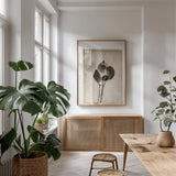 Glass Plate I by Deborah Revell. shown as a print in a natural wood frame in a dining room. Available as a archival giclee rolled canvas, fine art paper, or poster print. SKU 94346h.