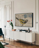 Great Tit by Deborah Revell. shown as a framed stretched canvas in a living room above a console. Available as a archival giclee rolled canvas, fine art paper, or poster print. SKU 101618i.