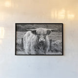 Happy Highland Portrait by Deborah Revell. shown as a paper print in a black flame. Available as a archival giclee rolled canvas, fine art paper, or poster print. SKU 95760i.
