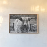 Happy Highland Portrait by Deborah Revell. shown as a paper print in a natural frame. Available as a archival giclee rolled canvas, fine art paper, or poster print. SKU 95760i.