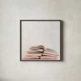 Heaven in Books by Deborah Revell. Shown in a sleek black glass frame for a contemporary gallery look. Available as an archival giclee rolled canvas, fine art paper, or poster print. SKU 96926a.