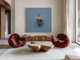 Hope Cove Shells IV by Deborah Revell. Shown as extra-large giant wall art in a modern living room. Available as an archival giclee rolled canvas, fine art paper, or poster print. SKU 96596a.