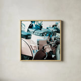 Italian Scooter I by Deborah Revell. Shown in a natural wood glass frame for a timeless modern aesthetic. Available as an archival giclee rolled canvas, fine art paper, or poster print. SKU 91132a.