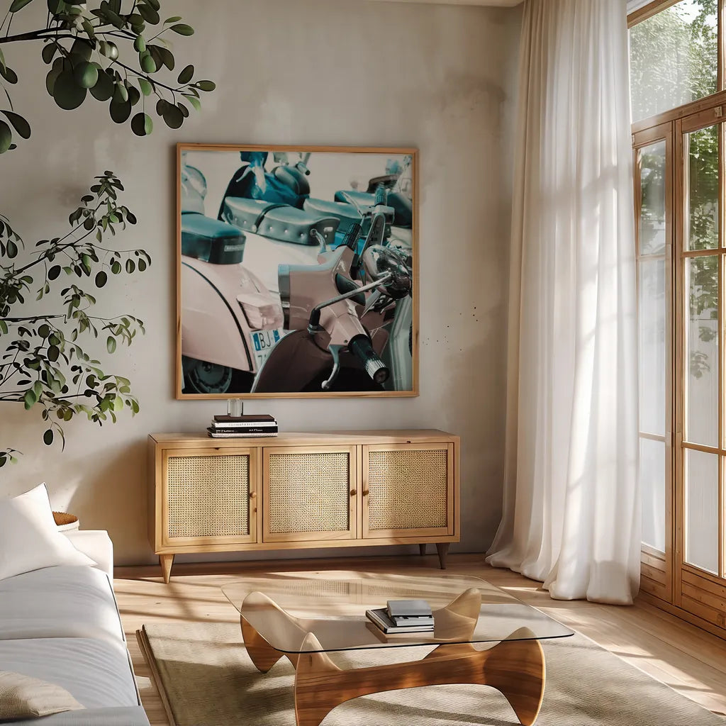 Italian Scooter I by Deborah Revell. Shown in a natural wood frame in a cozy modern living room. Available as an archival giclee rolled canvas, fine art paper, or poster print. SKU 91132a.