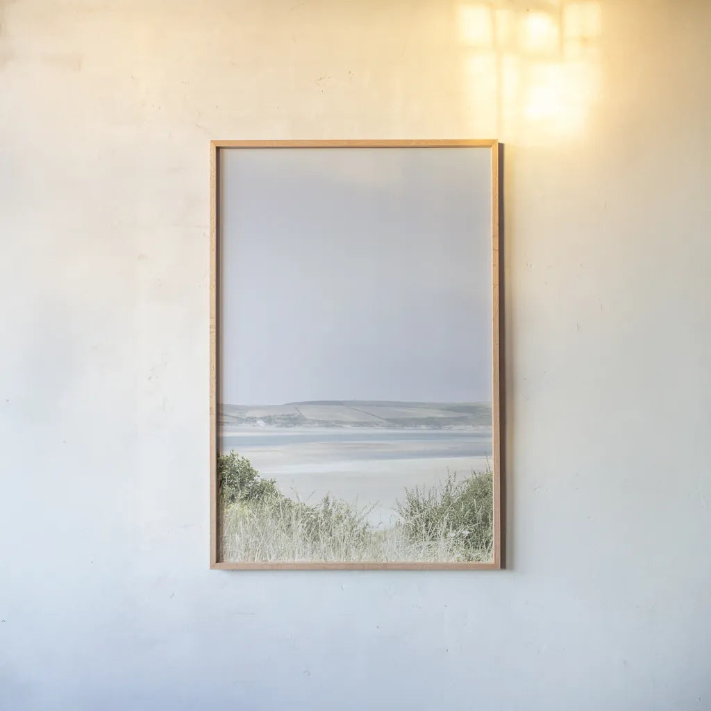 Light and Sand V by Deborah Revell. shown as a paper print in a natural frame. Available as a archival giclee rolled canvas, fine art paper, or poster print. SKU 101052h.