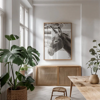 Little Donkey V by Deborah Revell. shown as a print in a natural wood frame in a dining room. Available as a archival giclee rolled canvas, fine art paper, or poster print. SKU 100661h.