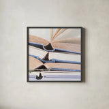 Livres Bleu by Deborah Revell. Shown in a sleek black glass frame for a contemporary gallery look. Available as an archival giclee rolled canvas, fine art paper, or poster print. SKU 96919a.