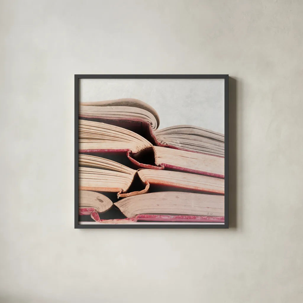 Livres Rouge by Deborah Revell. Shown in a sleek black glass frame for a contemporary gallery look. Available as an archival giclee rolled canvas, fine art paper, or poster print. SKU 96920a.