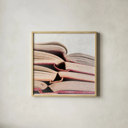 Livres Rouge by Deborah Revell. Shown in a natural wood glass frame for a timeless modern aesthetic. Available as an archival giclee rolled canvas, fine art paper, or poster print. SKU 96920a.
