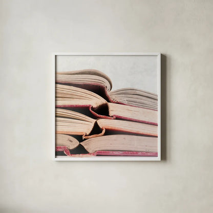 Livres Rouge by Deborah Revell. Shown in a crisp white glass frame for a clean and minimalist style. Available as an archival giclee rolled canvas, fine art paper, or poster print. SKU 96920a.