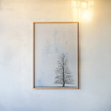 Lone Tree by Deborah Revell. shown as a paper print in a natural frame. Available as a archival giclee rolled canvas, fine art paper, or poster print. SKU 90975h.