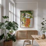 Oranges I by Deborah Revell. shown as a print in a natural wood frame in a dining room. Available as a archival giclee rolled canvas, fine art paper, or poster print. SKU 94128h.