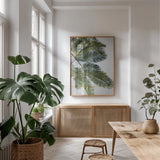 Palm Branch by Deborah Revell. shown as a print in a natural wood frame in a dining room. Available as a archival giclee rolled canvas, fine art paper, or poster print. SKU 91855h.