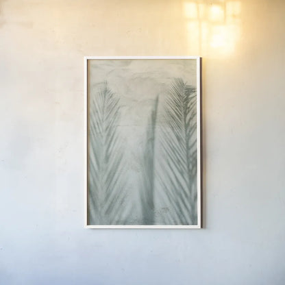 Palm Shadow II by Deborah Revell. shown as a paper print in a white frame. Available as a archival giclee rolled canvas, fine art paper, or poster print. SKU 94355h.